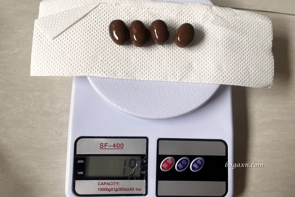 COSTCO巧克力│明治杏仁可可球。巧克力偏甜但杏仁果很唰嘴 - 第9張圖 COSTCO巧克力│明治杏仁可可球。巧克力偏甜但杏仁果很唰嘴